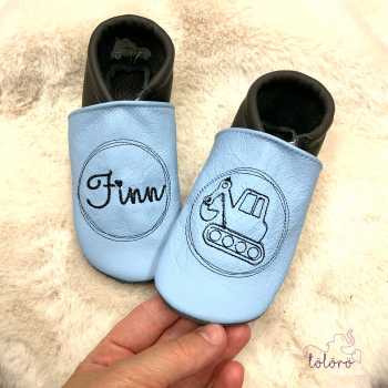 Name im Kreis und Bagger