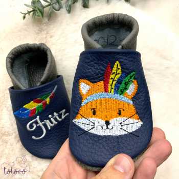 Name mit Feder und Fuchskopf