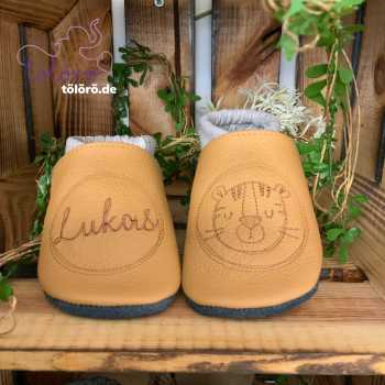 Name im Kreis und Tiger