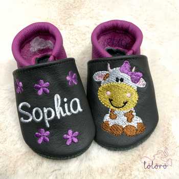 Name mit Blümchen und Kuhmädchen