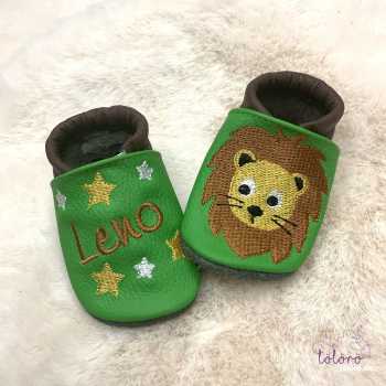 Name mit Sternen und Löwenkopf