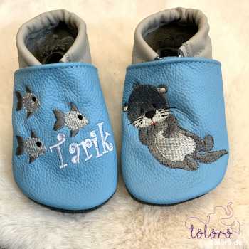 Name mit Fischen und Otter