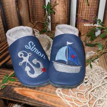 Name mit Anker und Boot