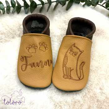 Name mit Pfoten und Katze Tom