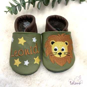 Name mit Sternen und Löwenkopf