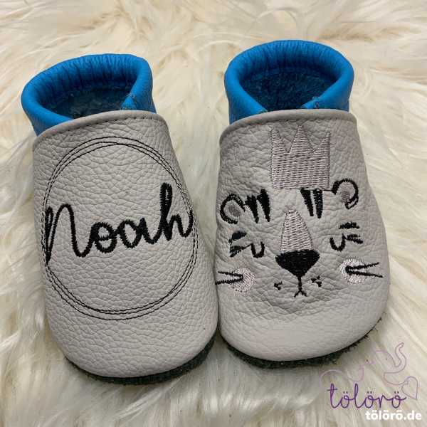 Name im Kreis und Tigergesicht mit Krone