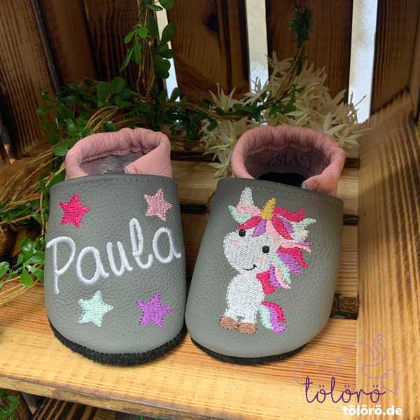 Name mit Sternen und Einhorn