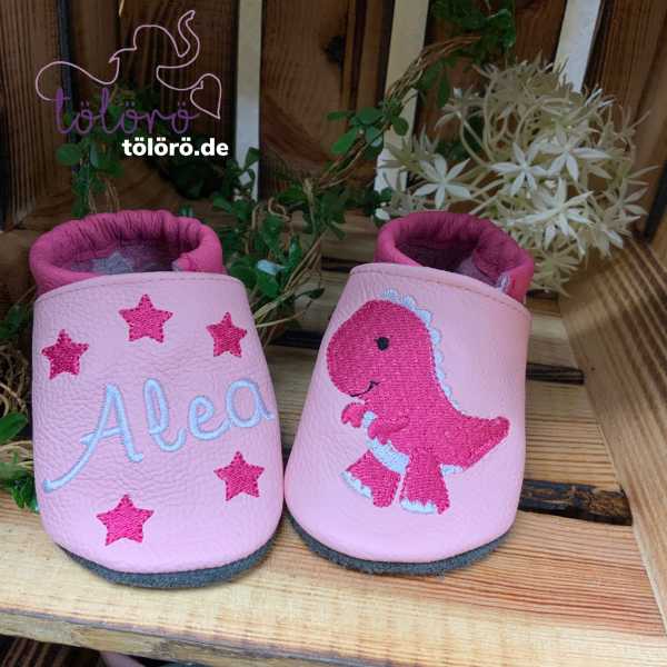 Name mit Sternen und Dinosaurier