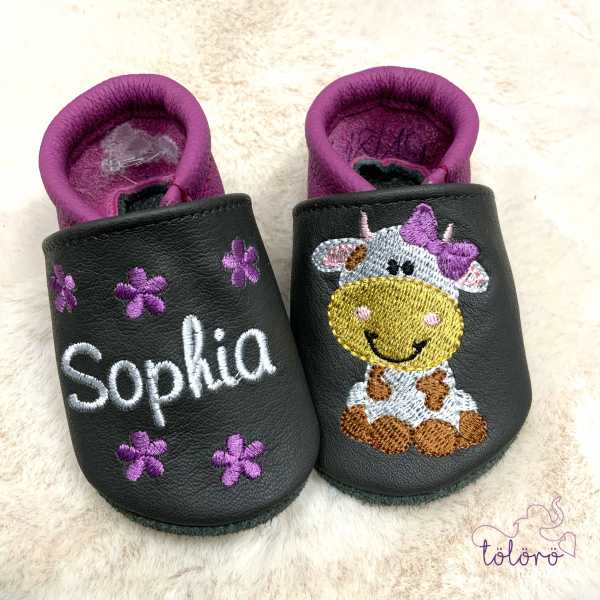 Name mit Blümchen und Kuhmädchen