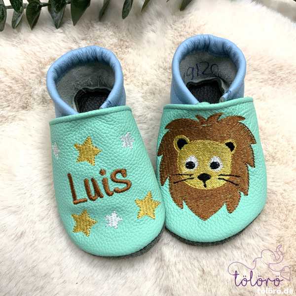 Name mit Sternen und Löwenkopf