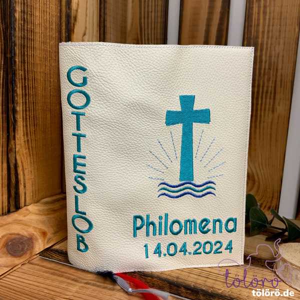 Gotteslobhülle gefülltes Kreuz mit Wellen