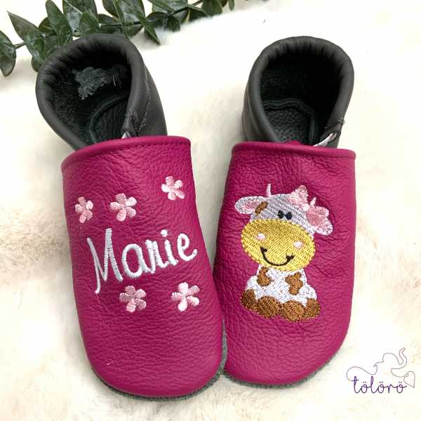 Name mit Blümchen und Kuhmädchen