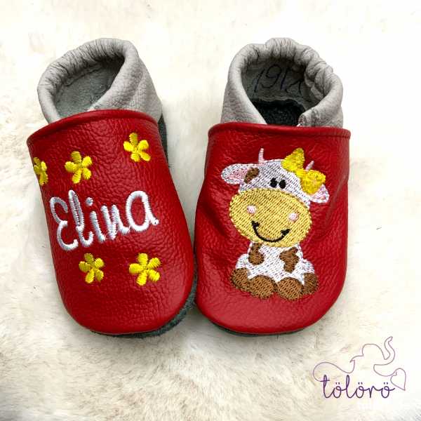 Name mit Blümchen und Kuhmädchen