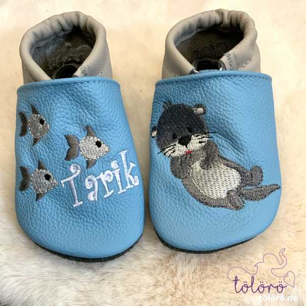 Name mit Fischen und Otter