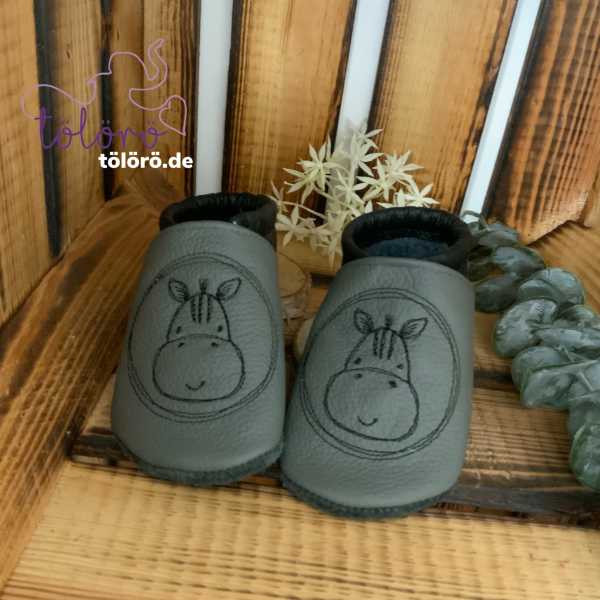 Name im Kreis und Zebra