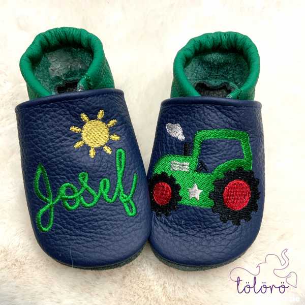 Name mit Sonne und Traktor