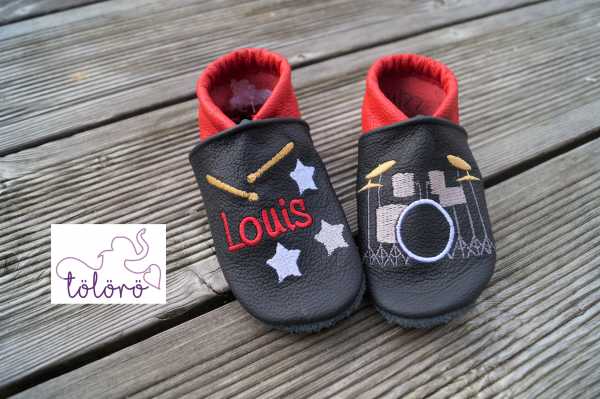 Name mit Sternen und Schlagzeug