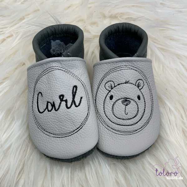 Name im Kreis und Bär