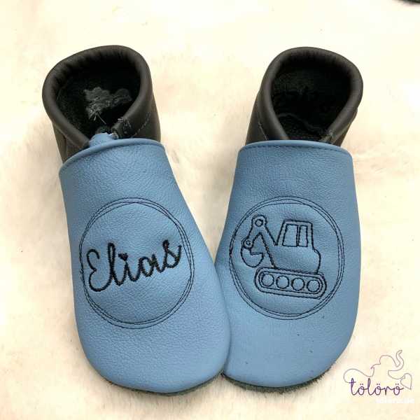 Name im Kreis und Bagger