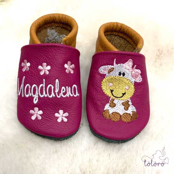 Name mit Blümchen und Kuhmädchen